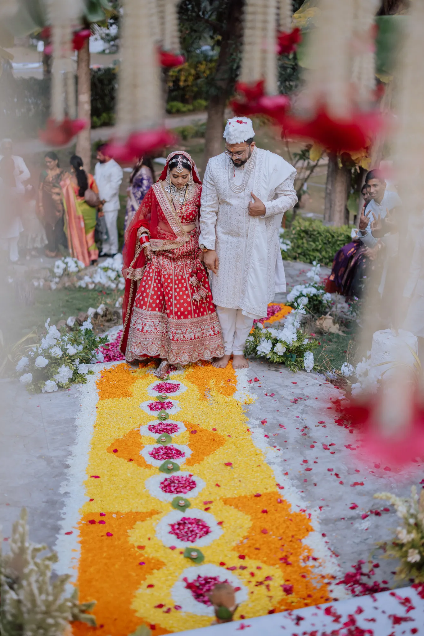 Candid wedding moment of couple holding hands