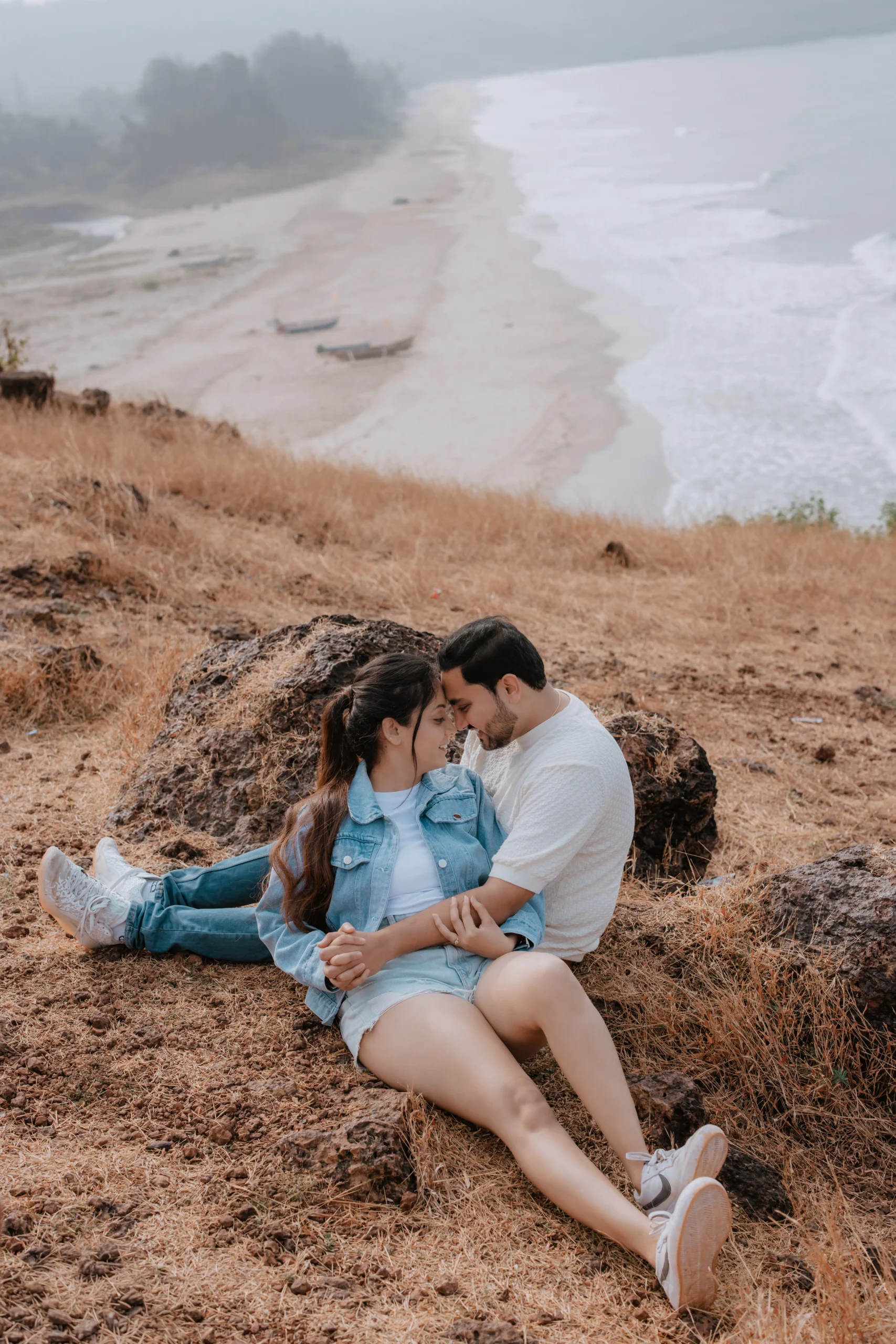 Pre wedding shoot creative pose near beach