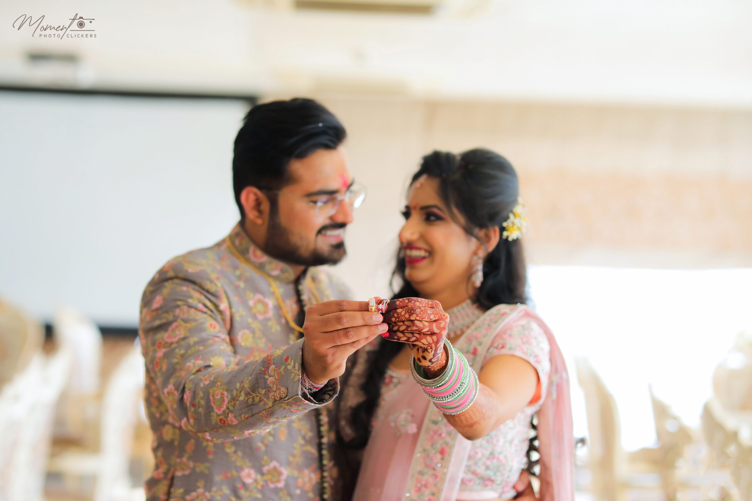 Couple posing with their Rings | Wedding Shoot