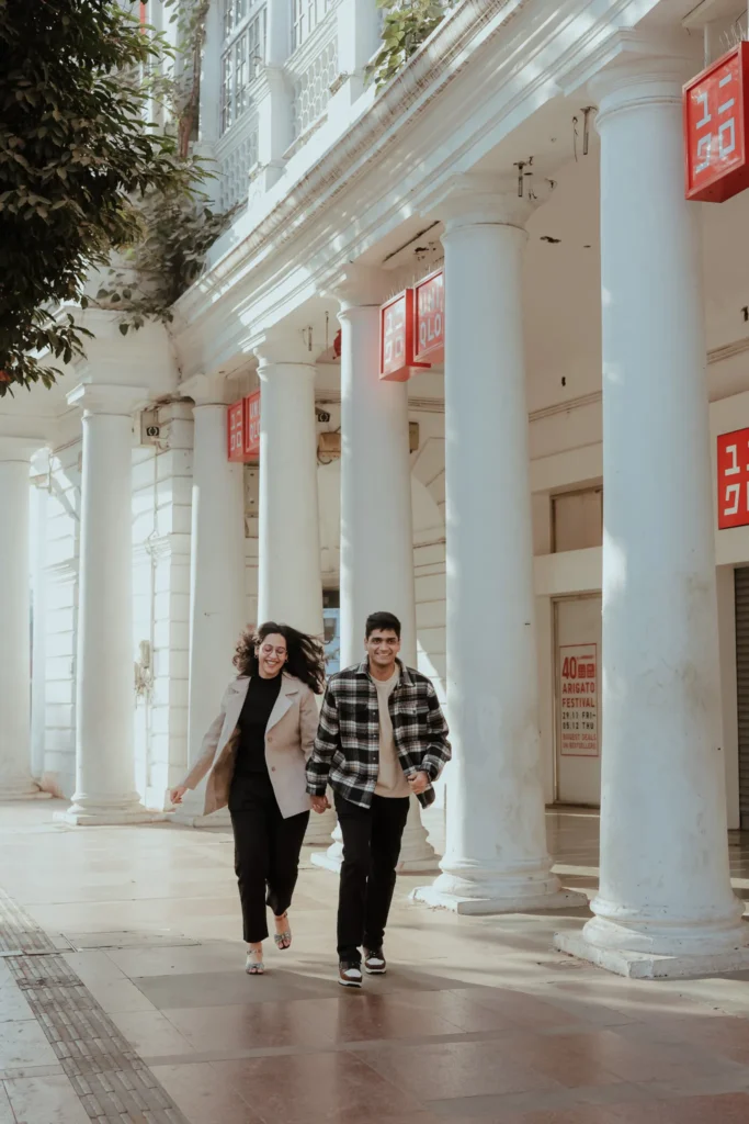 Pre wedding shoot couple holding hands & running